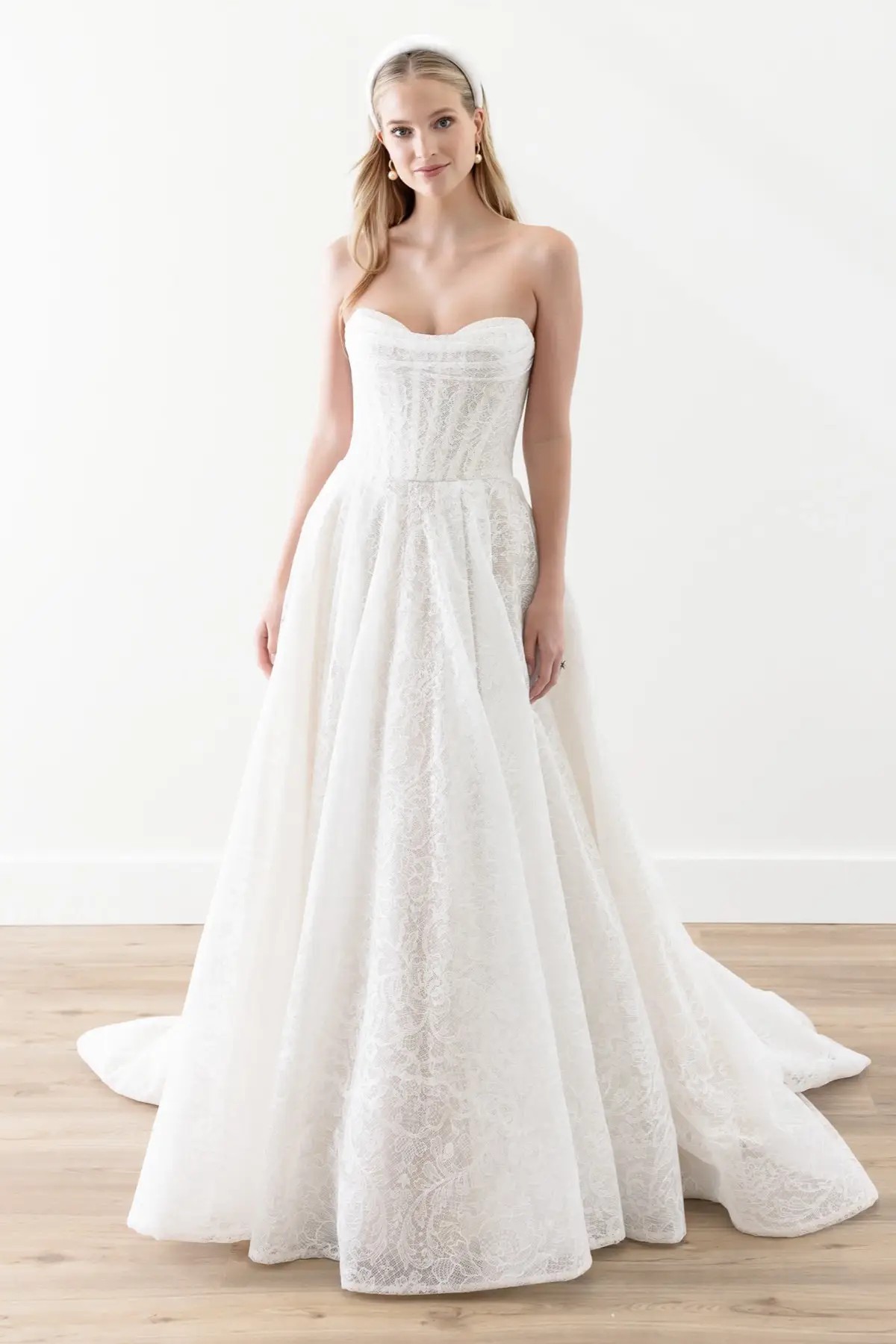 Model wearing a white dress