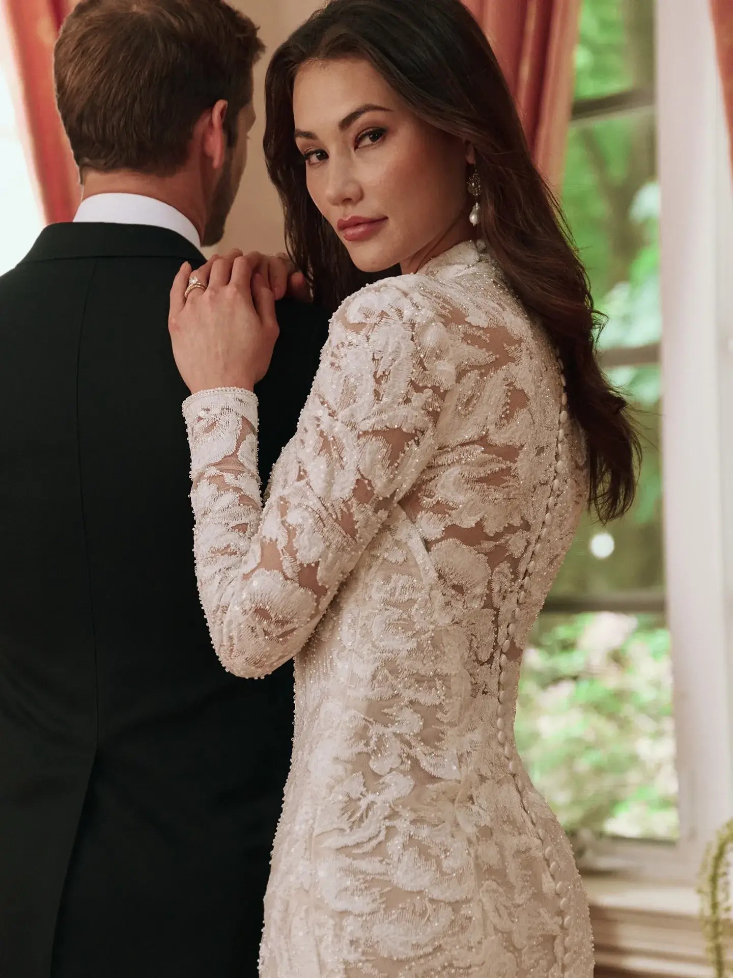 Unveiling the Latest Trends in Wedding Gowns: From Dramatic Details to Unique Necklines Image