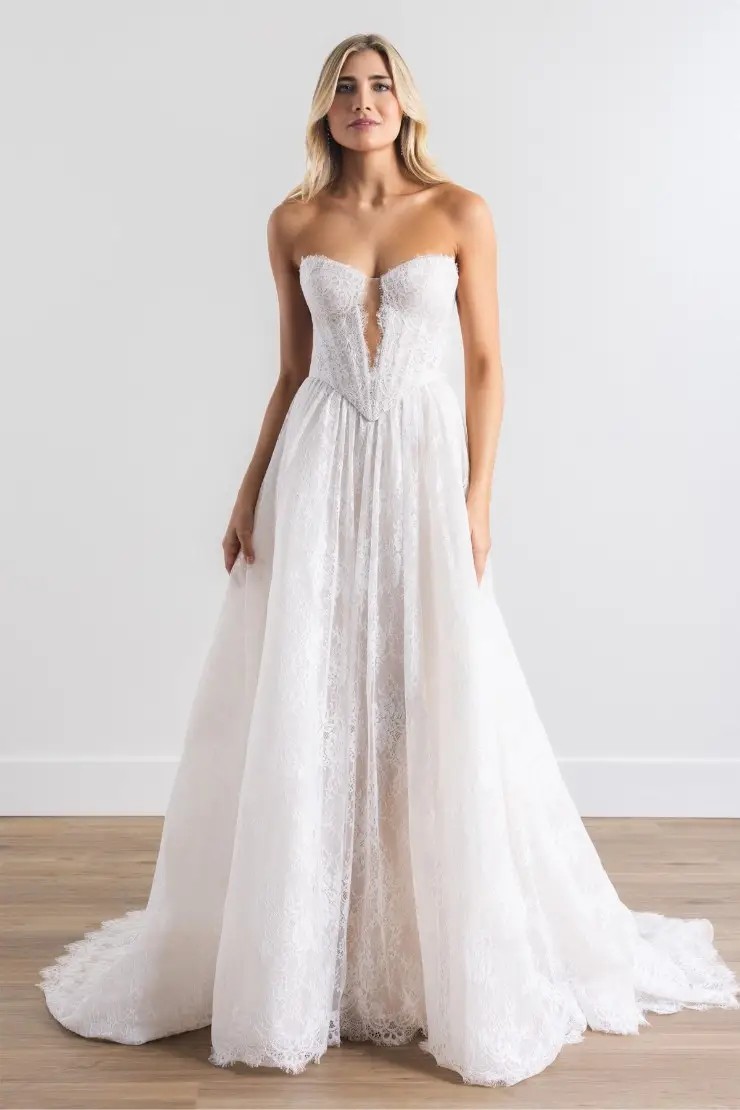 Model wearing a white dress