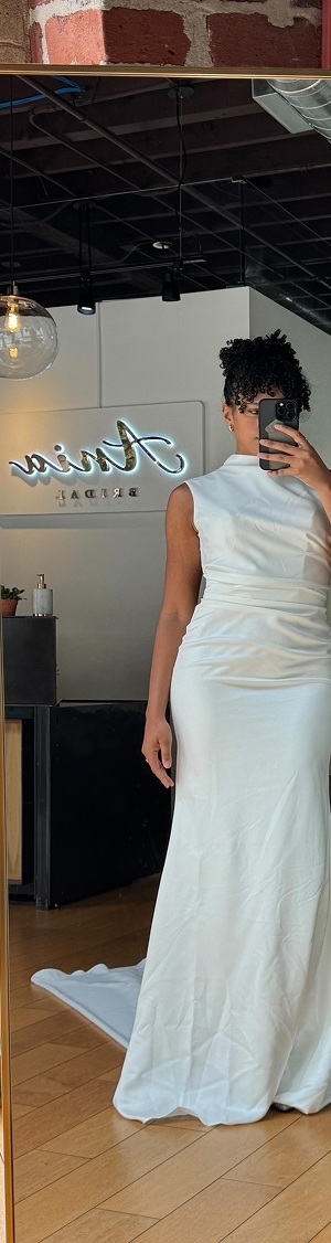 Photo of the model wearing a bridal gown