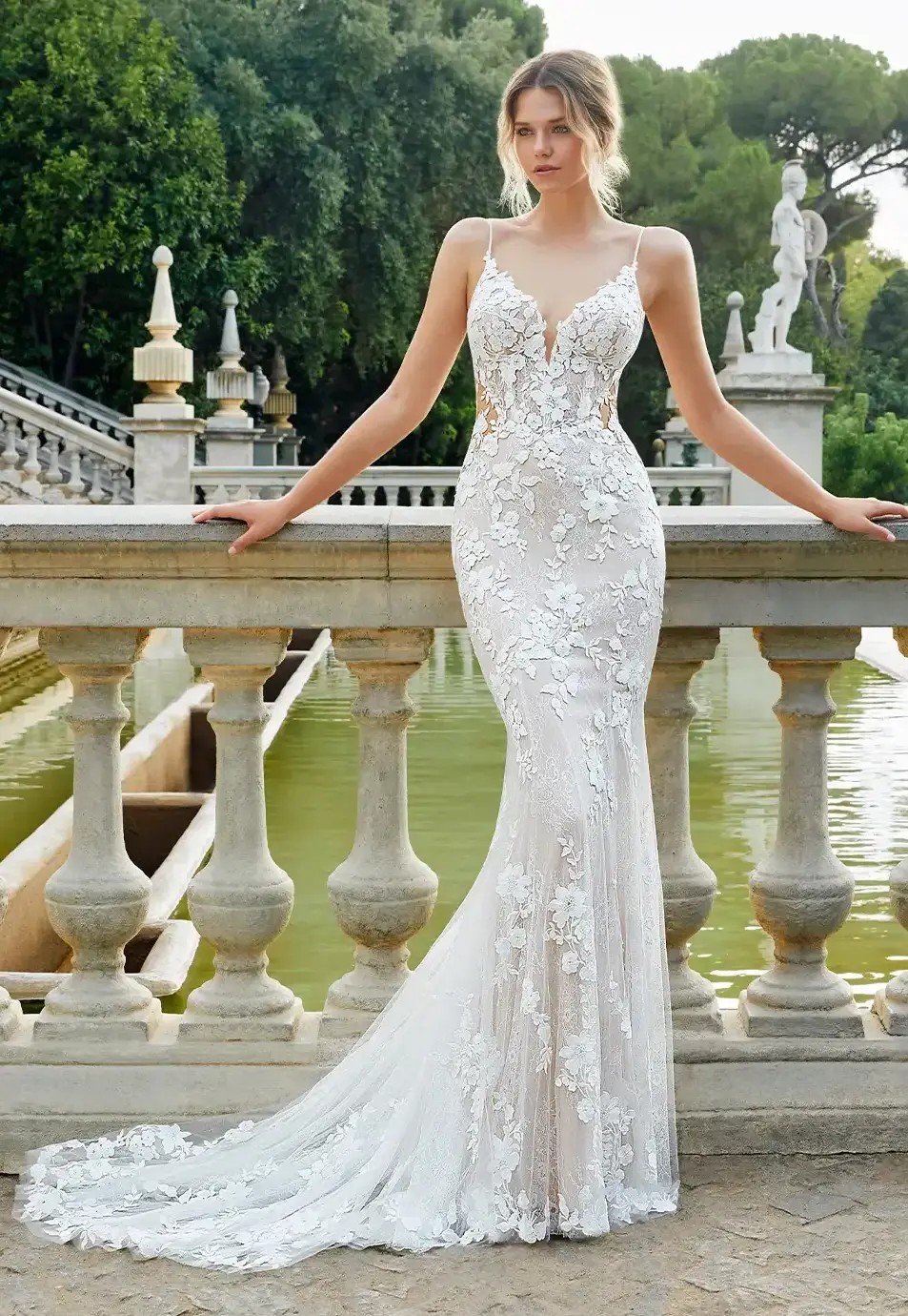 Model wearing a white gown by Enzoani