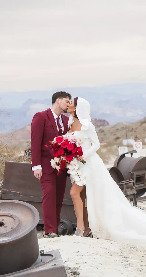 Couple wearing a white gown and navy suit