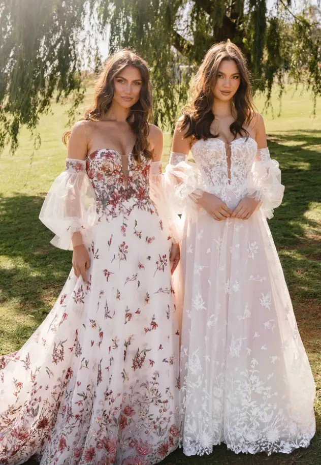 Model wearing a white gown by MADI LANE