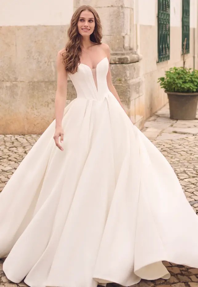 Model wearing a white gown by Maggie Sottero